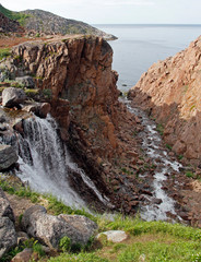 The Batareisky waterfall at Teriberka village in Russia