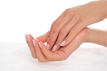 Delicate, smooth hands isolated on white background.