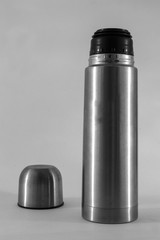 Stainless steel vacuum flask black and white isolated on the white background