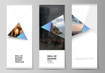 The vector layout of roll up banner stands, vertical flyers, flags design business templates. Creative modern background with blue triangles and triangular shapes. Simple design decoration.