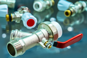 Concept Plumbing equipment.Details for installing water supply.Fittings for plumbing.Spare parts for the mixer.Details of the pipeline.Connect the pipe to the tap.Installation of the crane on the pipe