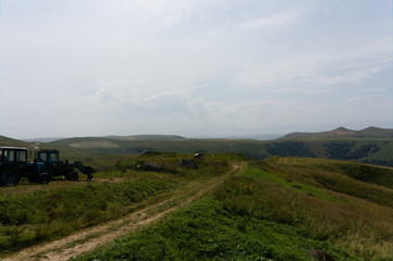 Gumbashi pass view in the russian caucasus, green meadow landscape at an altitude of above 2000 m