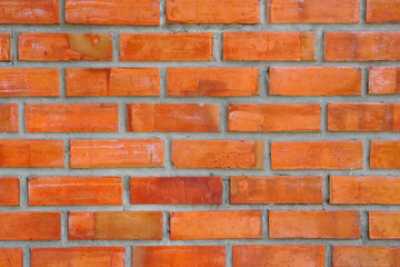 orange with brown brick wall for floor loft and retro style for texture background and wallpaper or interior and exterior construction