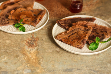 pancakes  chocolate (fritter with cocoa, delicious breakfast dessert) menu concept. food background. copy space. Top view