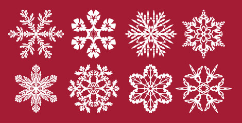 Obraz na płótnie Canvas Set of snowflakes. Christmas or New Year decoration. Templates for laser cutting, plotter cutting or printing. Vector illustration. Elements of festive background.