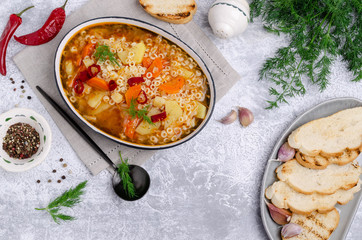 Thick vegetable soup with pasta