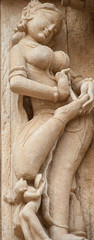 Sculptures on the walls of famous Khajuraho Temples in India. Khajuraho Temples are one of the...