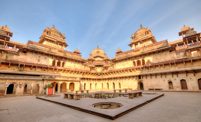 Fototapeta na wymiar Jahangir Mahal Inside Orchha Fort Complex, Orchha, Madhya Pradesh, India. Jahangir Mahal is a palace that was exclusively built by Bir Singh Deo in 1605 to humor the Mughal emperor Jahangir.