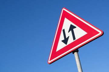 Dutch road sign: two-way traffic ahead