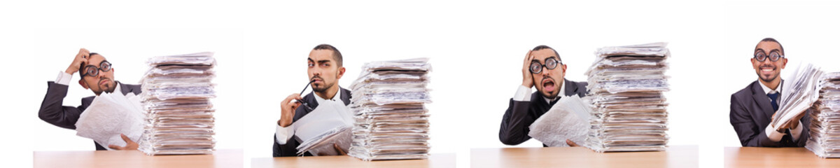 Busy businessman with lots of papers