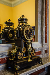 Naklejka na ściany i meble Old antique vintage classic clock in mansion