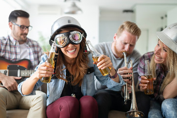 Group of happy friends having fun and party