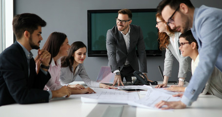 Group of business people collaborating in office