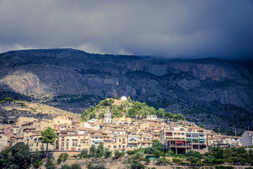 Fototapeta na wymiar A stormy cloudy afternoon in small mountain village Sella, Costa Blanca, Alicante, 2018 Spain