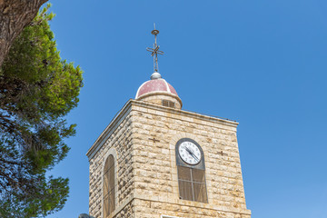 Top of the clock tower of the Greek Orthodox Monastery of the Transfiguration located on Mount...
