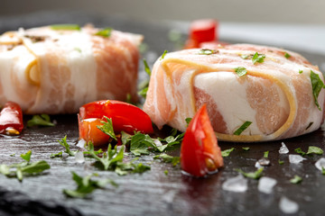 Goat cheese covered with smoked bacon