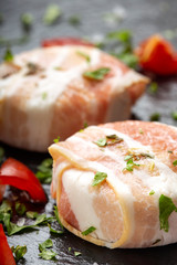 Goat cheese covered with smoked bacon