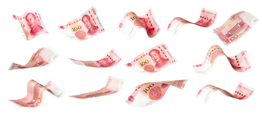 Flying of China Yuan banknote on white background. Yuan banknote is main and popular currency of exchange in the world.Investment and saving concept.