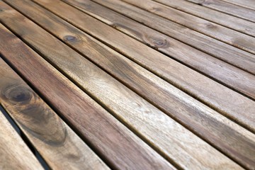 Fototapeta premium Wooden lumber table surface for a garden, bright texture