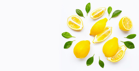 Fresh lemon and  slices with leaves isolated on white