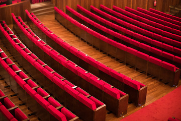 Fototapeta premium Empty red seats in a conference room