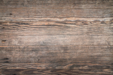 Fototapeta premium Tło wzór drewna, stara drewniana ściana z pięknymi wzorami, widok z góry.