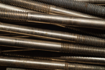 Steel screws close up. bolt thread. fasteners background. working tool