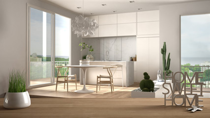 Wooden table, desk or shelf with potted grass plant, house keys and 3D letters home sweet home, over white and wooden living room, architecture interior design, copy space background