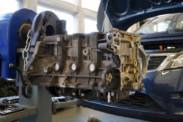 The engine block is removed for repair. Special equipment for repair. 