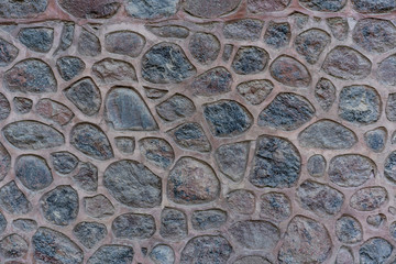 Wall of stone as texture and background