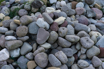 A large number of stones as a background and texture