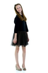 Beautiful school girl with long silky hair.