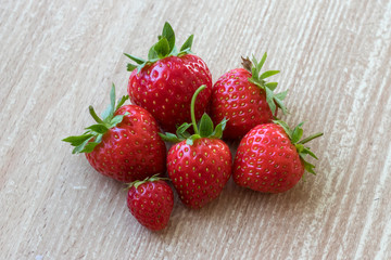 Ripe strawberries on a light table