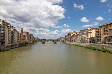Fototapeta na wymiar Panoramic view of Florence city and river Arno with bridge in Italy