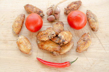 barbecue baked wings on nature
