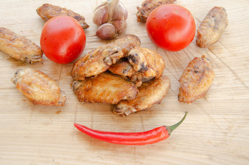 barbecue baked wings on nature