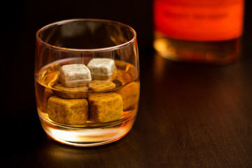 A glass of whiskey with chilled stones. Gentleman's Drink