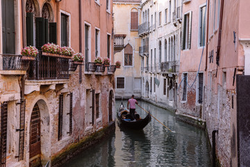 Fototapeta premium Panoramic view of Venice canal with historical buildings and gondolas