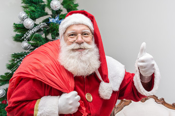 Santa Claus looking at the camera. Christmas is coming. Merry Christmas. Santa is watching