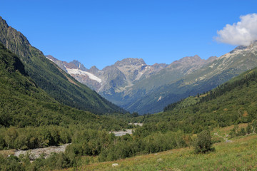Fototapeta na wymiar Closeup view mountains and river scenes in national park Dombay, Caucasus