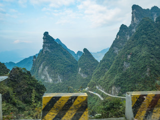 Beautiful view on the bus on tongtian road moving from tianmen mountain heaven gate cave on tianmen mountain national park at zhangjiajie city China.Tongtian Road the winding Road  99  curves road