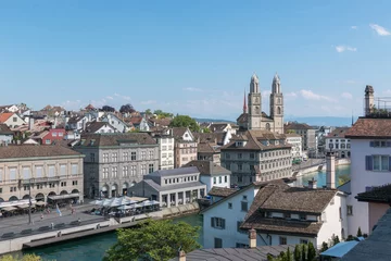 Deurstickers View of historic Zurich city and river Limmat from Lindenhof park, Zurich © TravelFlow
