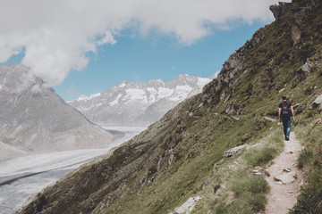 Fototapeta na wymiar Panorama of mountains scene, walk through the great Aletsch Glacier