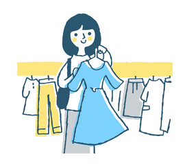 ショッピング　洋服を選ぶ女性　ブルー