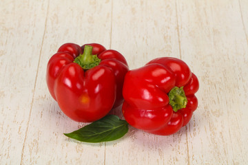 Ripe Red bell pepper over wooden