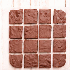 Chocolate squares with nuts and cranberries