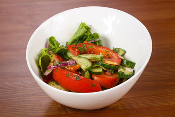 Vegetable salad with tomato, cucumbers