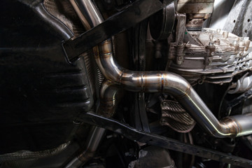 Fabrication and installation of a stainless steel car exhaust pipe with a bifurcation and a louder...
