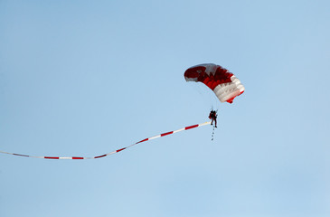 Parachute display team performs  during cricket festival at Isa Town, Bahrain