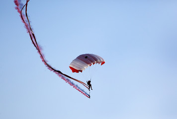 Parachute display team performs  during cricket festival at Isa Town, Bahrain